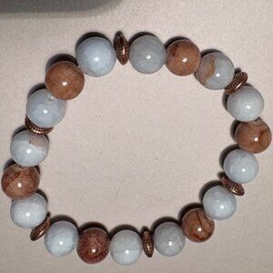 soft blue and earthy tones, this bracelet offers a calm, natural elegance